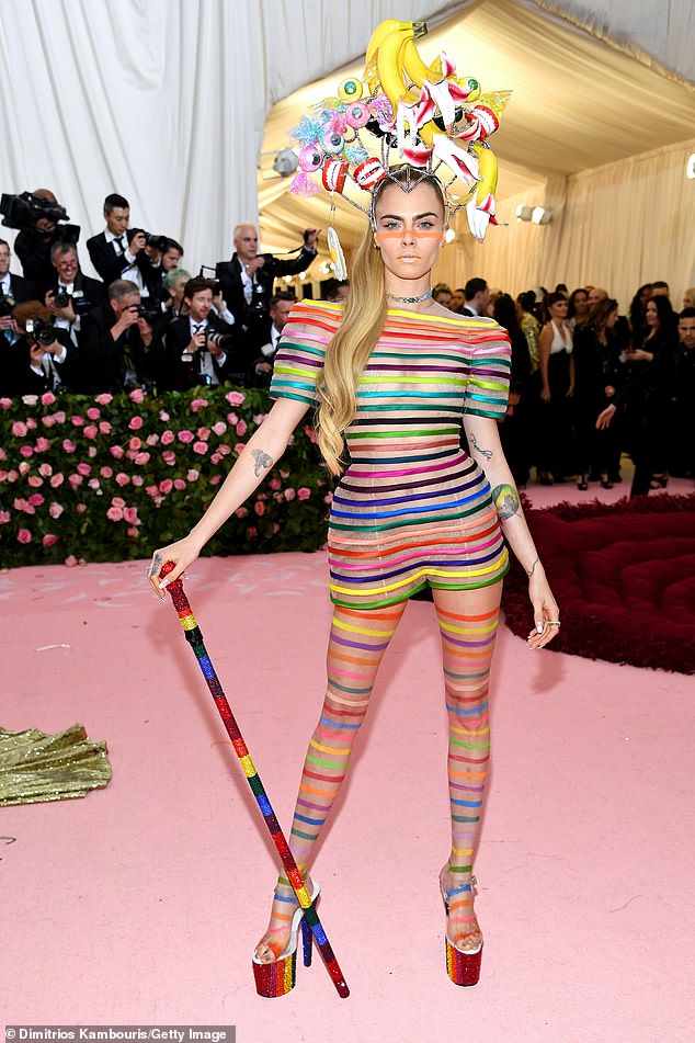 13176914-6999789-Colourful_display_Cara_Delevingne_fully_embraced_the_Camp_theme_-a-13_1557190594882